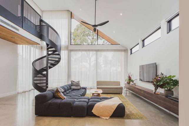 Melbourne Home Extension - Lounge with stunning spiral staircase